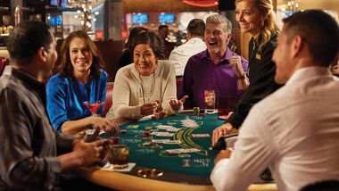 Group of people playing black jack