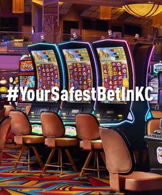 slot machines at Hollywood Casino at Kansas Speedway with text: "#YourSafestBetInKC"