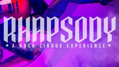 Rhapsody Logo with a purple background and girl with a guitar